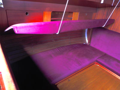 The port berth backrest is raised to reveal an unusually wide berth that extends to almost 4ft with the table lowered.